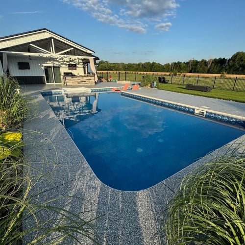 Concrete repair and epoxy coating around swimming pool for a smooth finish